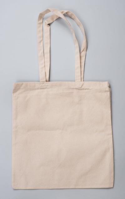 Tył jasnej torby płóciennej. 